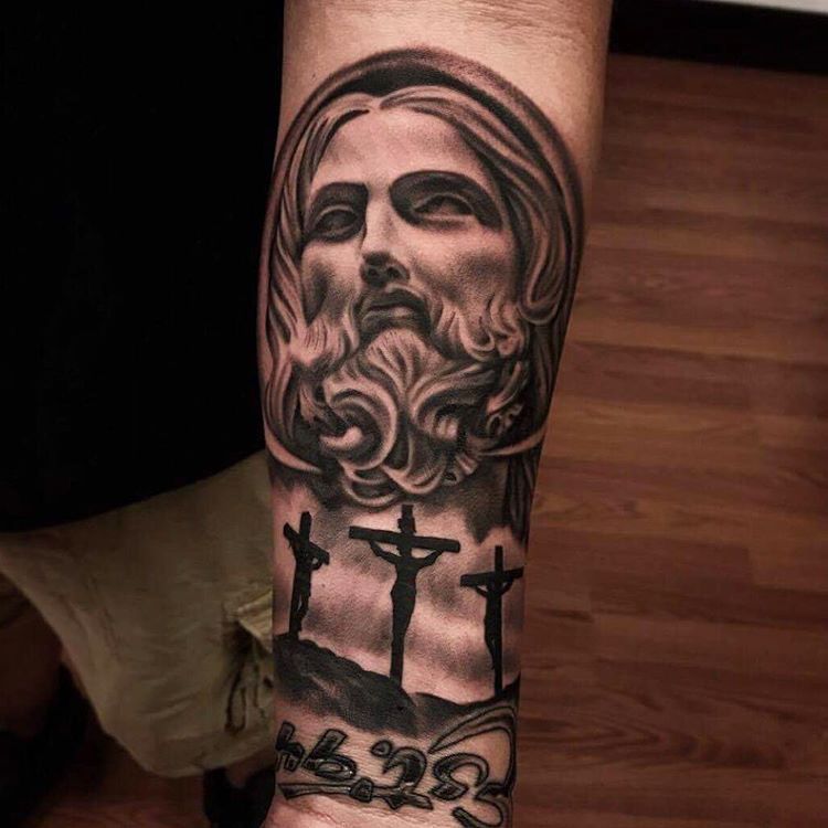 img/arm-tattoo-jesus-gesicht.jpg
