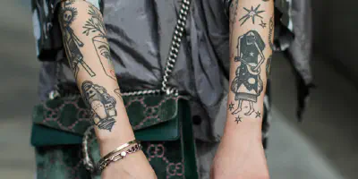 Arm Tattoo vor und nach dem Gewichtsverlust