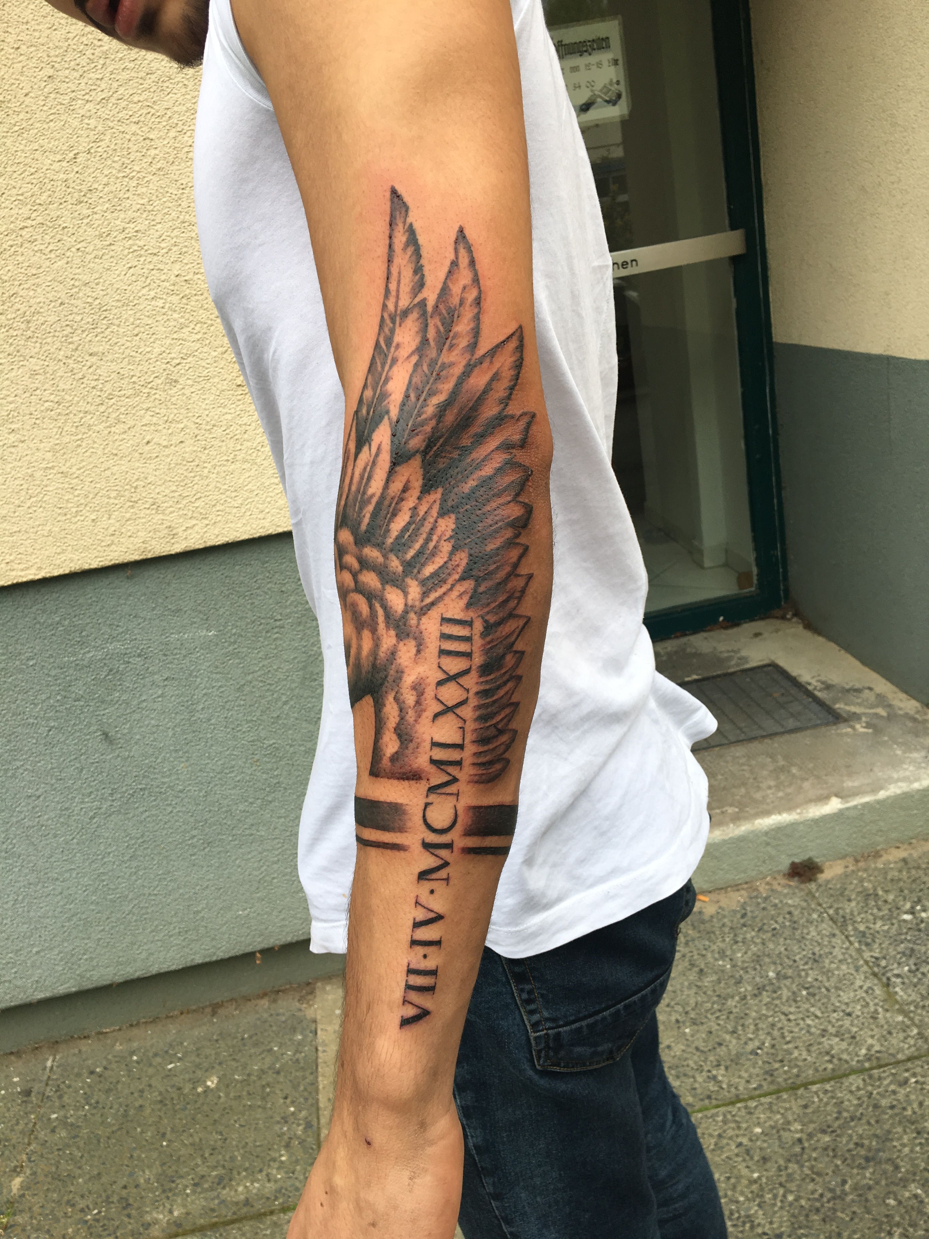 img/big-arm-tattoo-deutsch.jpg