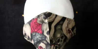 Die Bedeutung eines floralen Schädel-Arm-Tattoos