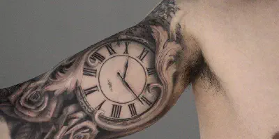 Die Bedeutung eines Löwen Uhr Arm Tattoos