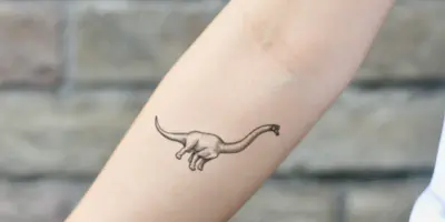 Dinosaurier-Arm-Tattoo: Eine Einzigartige Kunstform