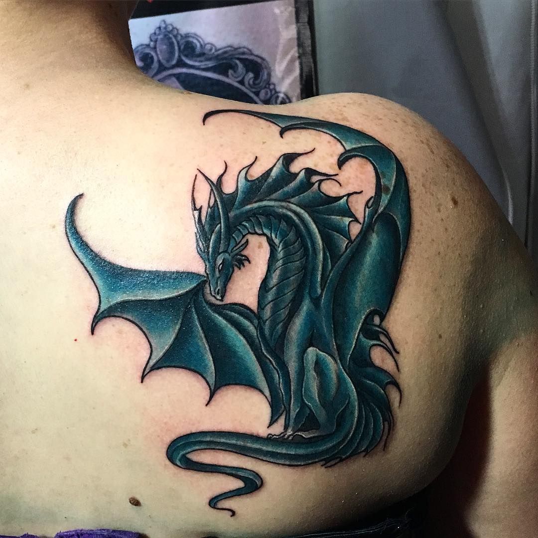 img/dragon-skin-arm-tattoo.jpg