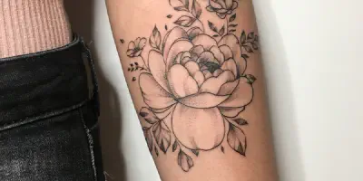 Feminines Arm Tattoo - Eine zeitlose und bedeutungsvolle Wahl