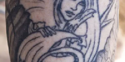 Heiliges Arm Tattoo Design