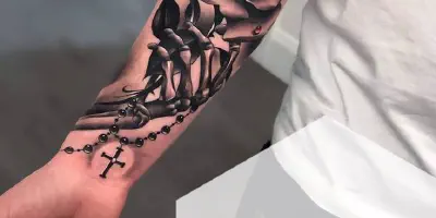 In the Frow Arm Tattoo