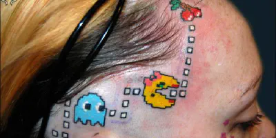Pac-Man Arm Tattoo: Ein zeitloser Gaming-Klassiker auf der Haut