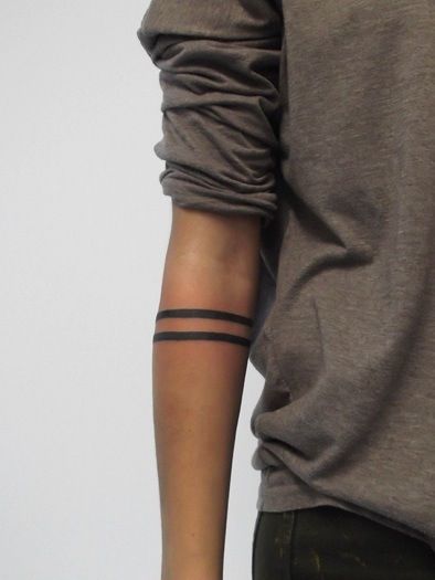 img/ringe-um-tattoo-am-arm.jpg