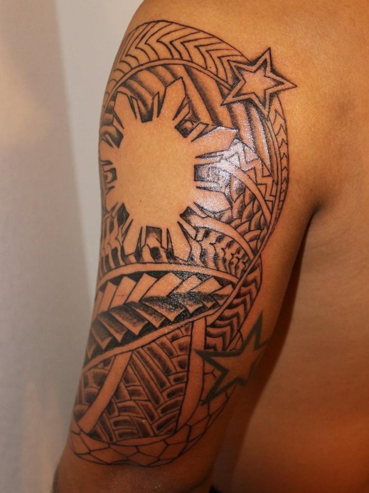 img/tribal-oberarm-tattoo.jpg