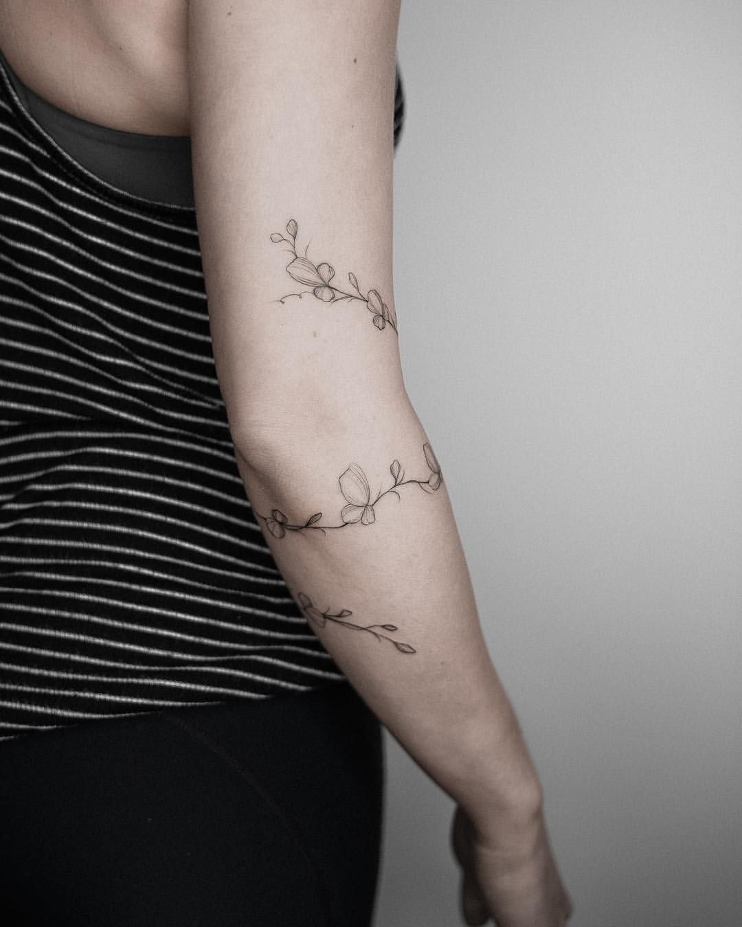 img/vine-arm-tattoo-ideen.jpg